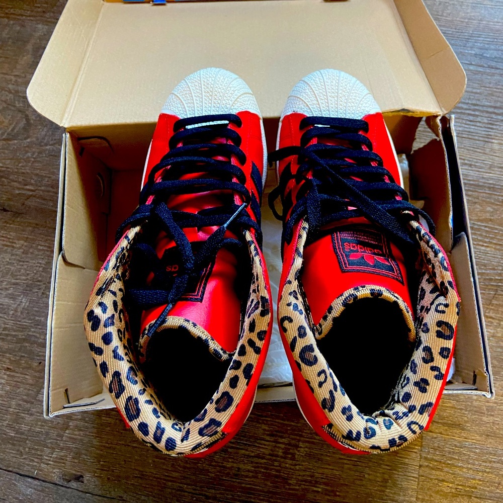 Red Adidas high tops. COLRED/BLACK1WHTVAP ROUGH/NOIR1/VAPBLA. Size 8 in men’s